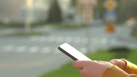 Close up of the smartphone device in hands of the young Caucasian woman in Stock Footage 140843684