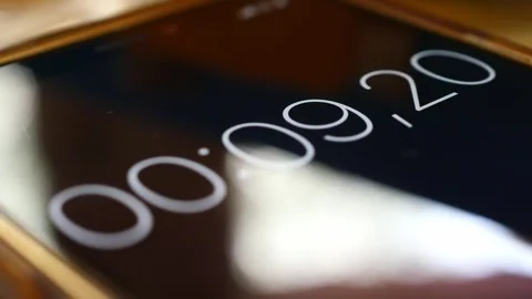 Close-up of smartphone digital stopwatch with white numbers Stock Footage 251722270