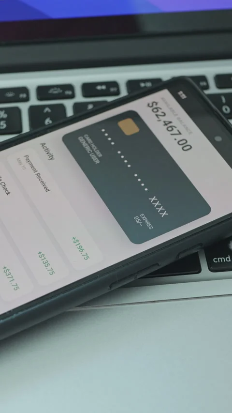 Close-up of smartphone displaying financial banking application Stockbeeldmateriaal 335528931