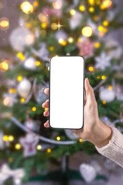 Close up smartphone with empty screen mockup on holiday background Stock Photos
