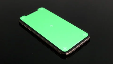 Close-up of smartphone with green screen Video stock 169935505
