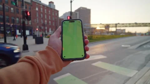 Close-Up Of Smartphone Mockup With Urban Background On Sunny Day Stock Footage 314114313