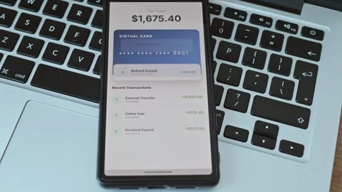 Close-up of smartphone screen displaying financial banking application Stock Footage 337998170