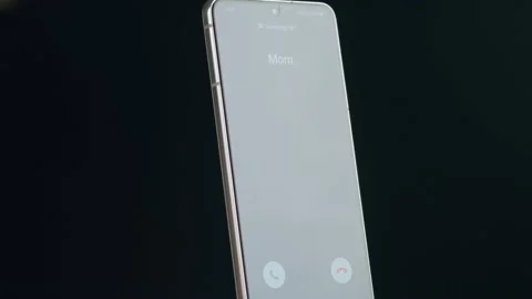 Close Up Smartphone Screen With Incoming Call Indication. Incoming Call From Mom Stock Footage 156728905