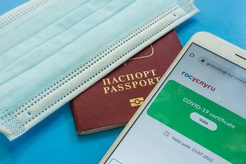 Close-up of a smartphone screen with the QR code of the covid-19 Stock Photos