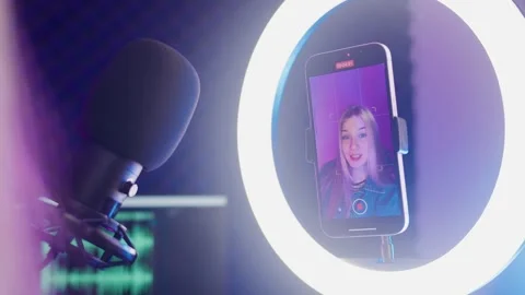 Close-up of a smartphone screen recording a selfie of a beautiful young woman Stock Footage 309797686