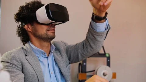 Close up of smiled man in VR glasses in the urban white office. Zoom-out. White Stock Footage 82498840