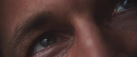 Close up of smiley blue eyes staring upwards Stock Footage 202249143