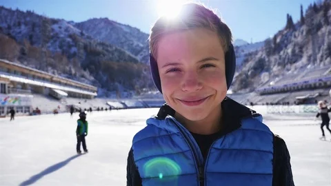 Close-up smiley boy face. Ice skating at ice rink outdoor Stock Footage 71303521