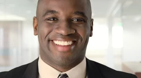 Close up of smiling African American Businessman Stock Footage