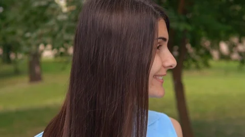 Close up smiling brunette in park Stock Footage 127855057