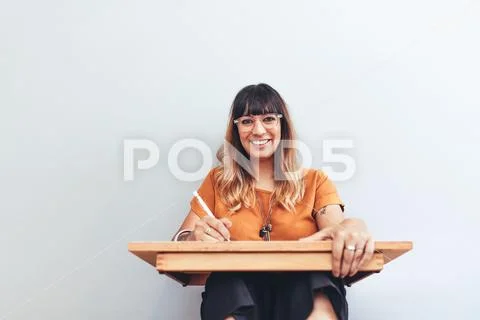 Close up of a smiling creative artist at work Stock Photos