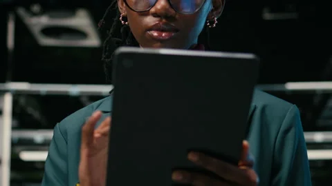 Close up of smiling data center female engineer futureproofing company network Stock Footage 329592004