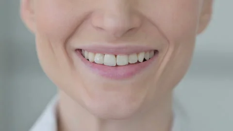 Close Up of Smiling Female Lips 스톡 동영상 233384908