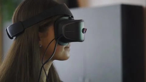 Close-up Smiling Girl Active Watching Eyes Video in Optical VR Headset. Slowmo Stock Footage 212092944