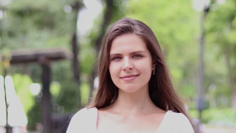 Close up of smiling girl looking at camera .fashion model face smiling. Stock Footage 156093768