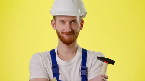 Close Up Smiling Male Builder, Engineer In Protective Hardhat Wear Blue Uniform Stock Footage 170187846
