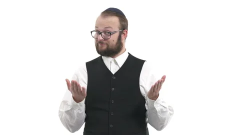 Close-up of a smiling man demonstrating presenting gesture. Man showing both 스톡 동영상 130181177