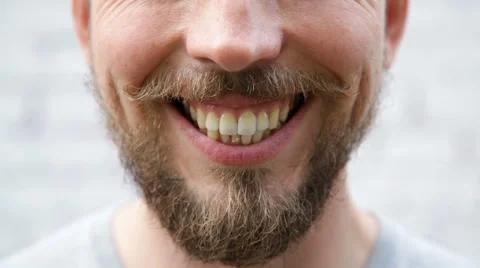 Close up  smiling man's face Stock Footage 67311053