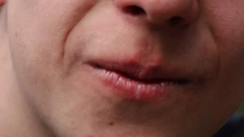 Close-up of a smiling person's face Stock Footage 135833739