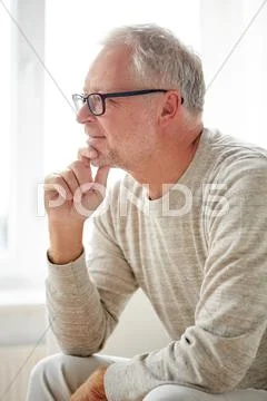 Close up of smiling senior man in glasses Stock Photos