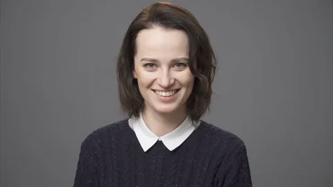 Close up smiling young woman's face Stock Footage 71001889