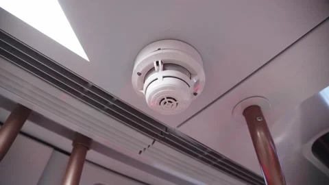 Close-up of smoke alarm on the ceiling of subway car. Fire security alarm in the Stock Footage 202049236