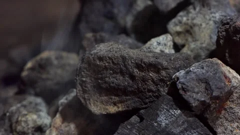 Close-up smoke from coals burning in the forge Video stock 243830440