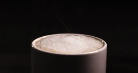 Close-up of Smoke rises from cup Stock Footage 260412701