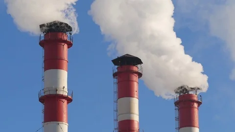 Close up smoke stack over blue sky background. Stock Footage 85366273