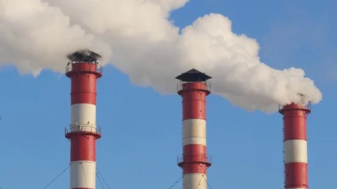 Close up smoke stack over blue sky background. Stock Footage 85369090
