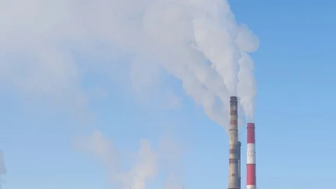 Close up smoke stack over blue sky background. Stock Footage 85382887