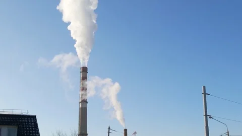 Close up smoke stack over blue sky background. Stock Footage 85383106