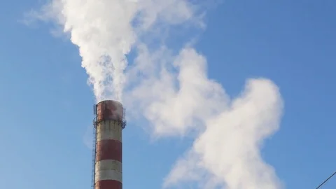 Close up smoke stack over blue sky background. Stock Footage 85383389
