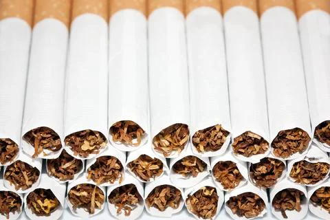 Close up of a smoking cigarettes in a stack Stock Photos