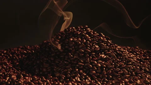 Close up of Smoking pile of roasted coffee beans. Stock Footage 145274986