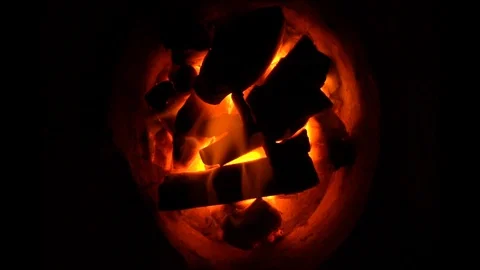 Close up of smoldering charcoal in a fireplace Video stock 101276646