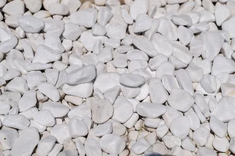 Close-up of Smooth White Pebbles Creating a Natural Stone Texture Stock Photos