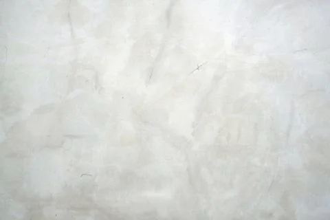 Close-up of a smooth white surface with a subtle grey marble texture effect Stock Photos