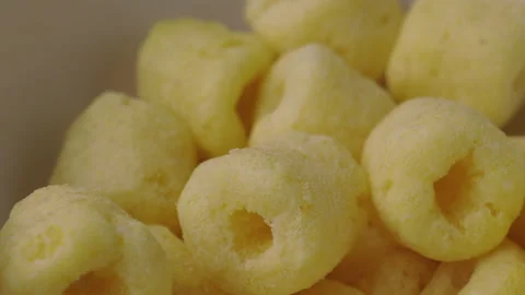 Close up snack food crispy Corn rings chips salty rotates slowly. Fast food Stock-Footage 152808437