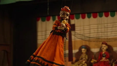 Close-Up of Snake Charmer Puppet with Snake Stock Footage 310734756