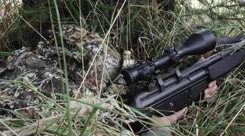 Camouflaged Sniper Rifle with Scope Stock Image - Image of