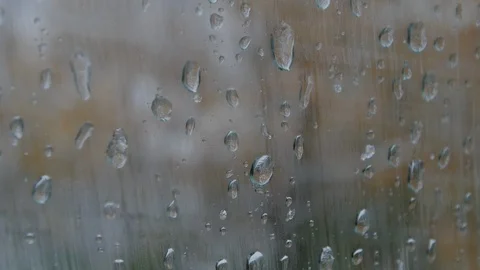 Close up of snow and rain drops on foggy window Stock Footage 98435936