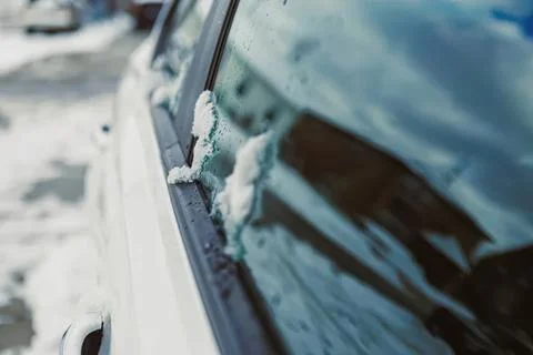Close-up of snow on car window in winter weather Stock Photos