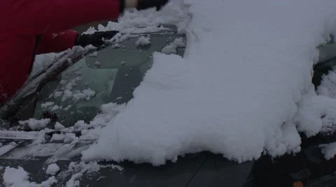 Close up of snow clearing, UK Stock Footage 1106901