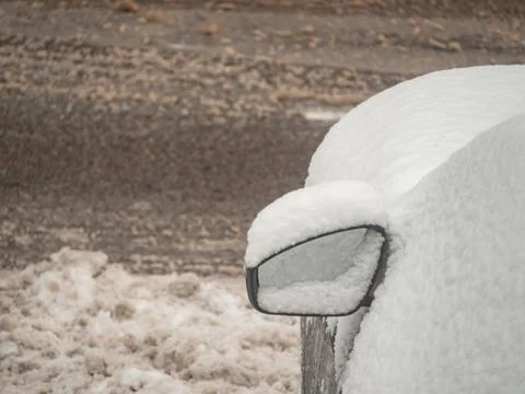Close up of snow covered car side mirror in winter Fotos de archivo