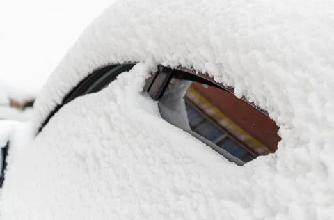 Close-up of snow-covered side Windows of a car Stock Photos