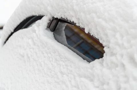 Close-up of snow-covered side Windows of a car Stock Photos