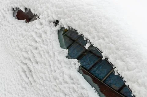Close-up of snow-covered side Windows of a car Stock Photos