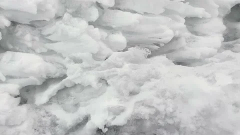 A close-up of the snow-covered surface of one of the weathering pillars 動画素材 179346095
